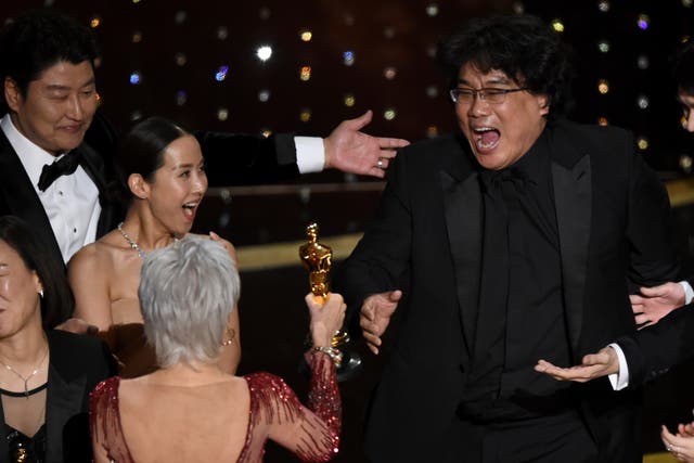Bong Joon Ho reacts as he is presented with the award for Best Picture for ‘Parasite’