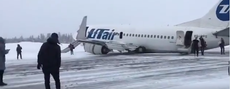 Plane crash-lands on its belly in Russia