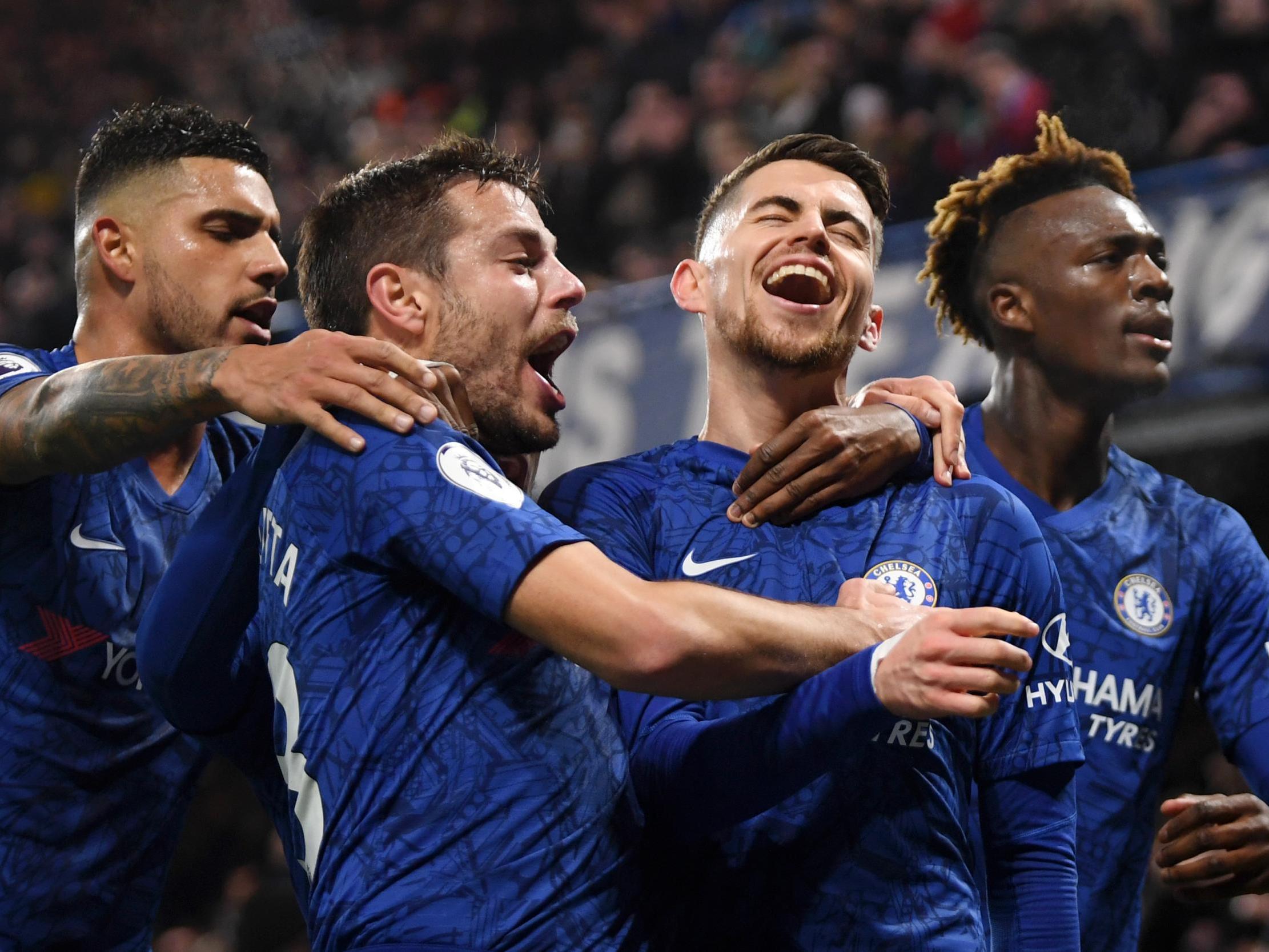 Jorginho of Chelsea celebrates with Cesar Azpilicueta and Tammy Abraham