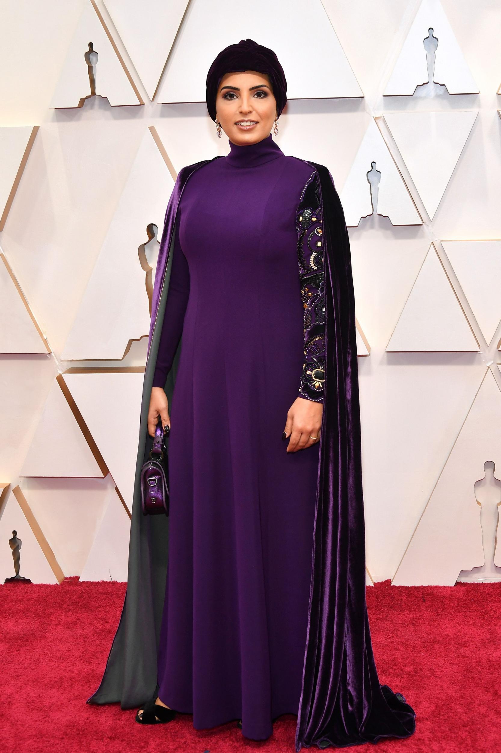 Fatma Al Remaihi wore a head-to-toe velvet gown with a matching cape and turban (Getty)
