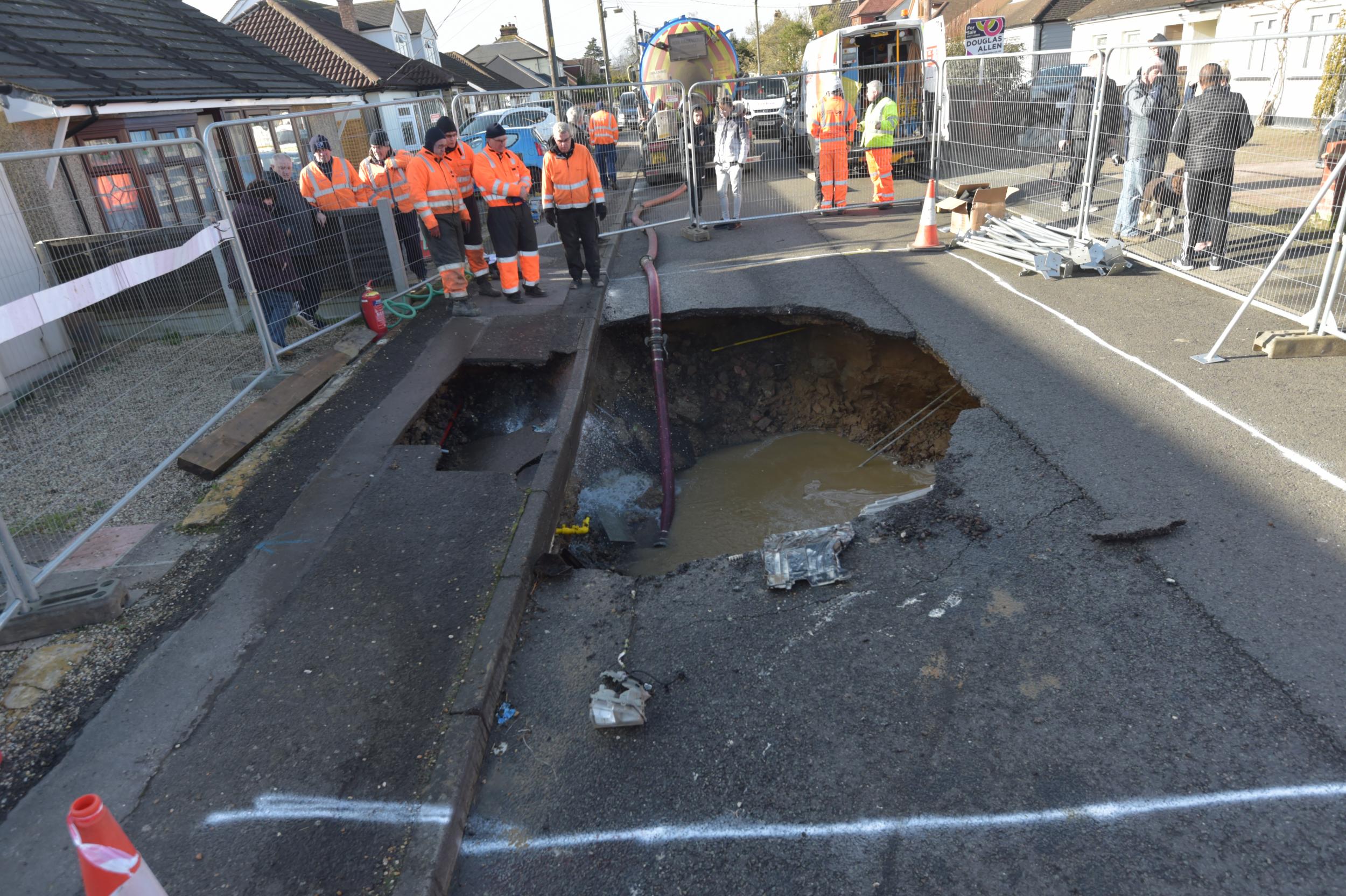 A sinkhole in Brentwood, Essex, following the removal of a car which became trapped in it overnight.