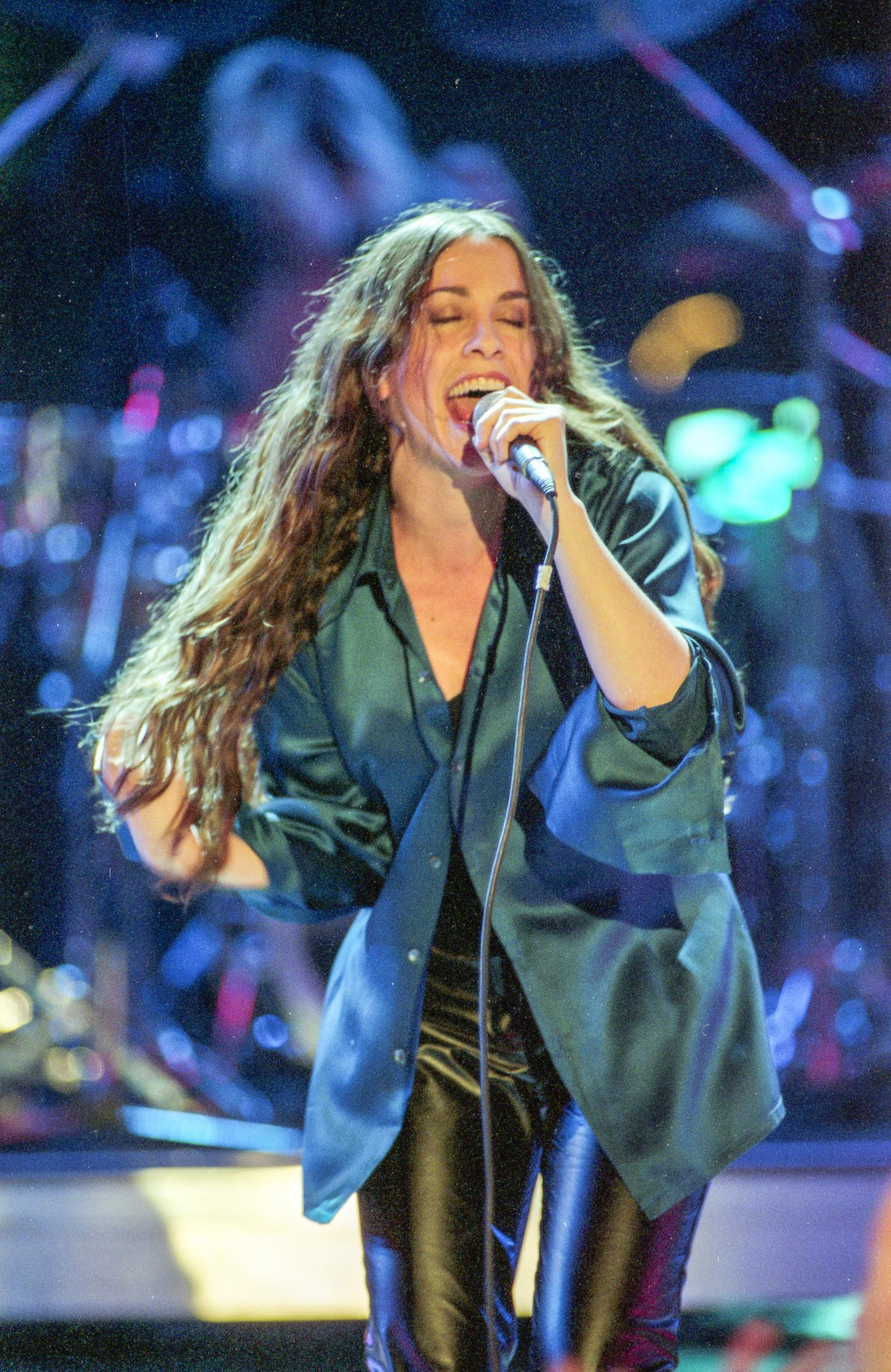 Alanis Morissette performs at the Brit Awards 1996