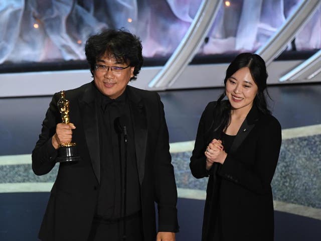 Bong Joon-ho, left, has described subtitles as a 'one-inch barrier'