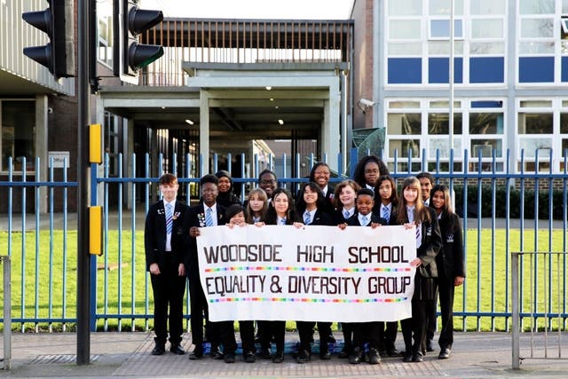 The head of Woodside High School said the abuse will not deter her from continuing equality work