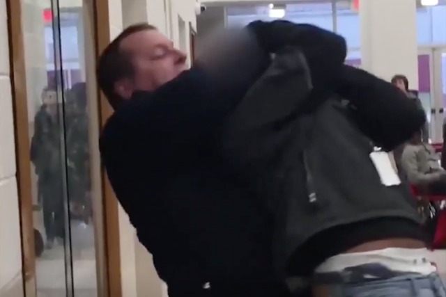 A police officer in Arkansas is on leave after being caught on video placing a student in a chokehold