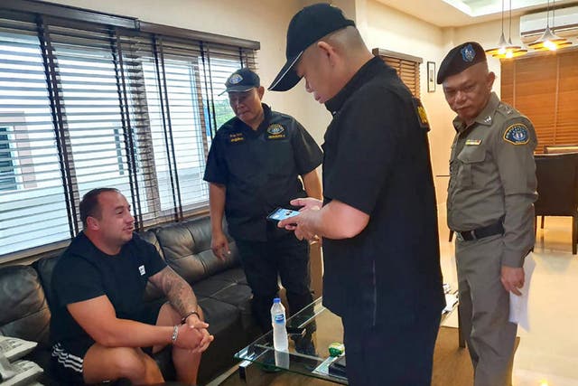 A Thai police handout photo of Mark John Rumble, 31, (left) who has been named as one of two British prisoners being  tested for coronavirus at HMP Bullingdon, in Oxfordshire.