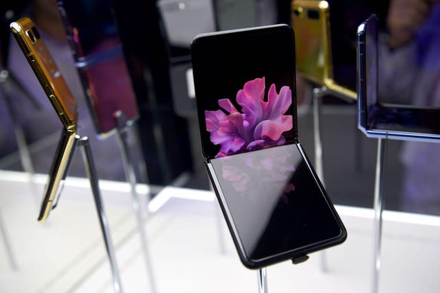 Samsung Galaxy Z Flip phones are seen on  display during the Samsung Galaxy Unpacked 2020 event in San Francisco, California on February 11, 2020