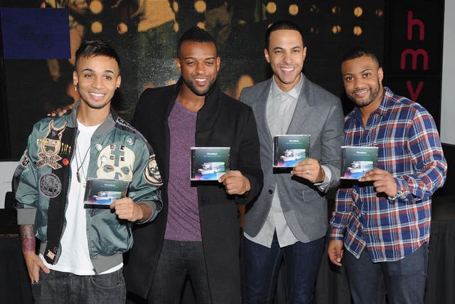 Aston Merrygold, Ortisé Williams, Marvin Humes, and JB Gill of JLS attends on 19 November 2013 in London.