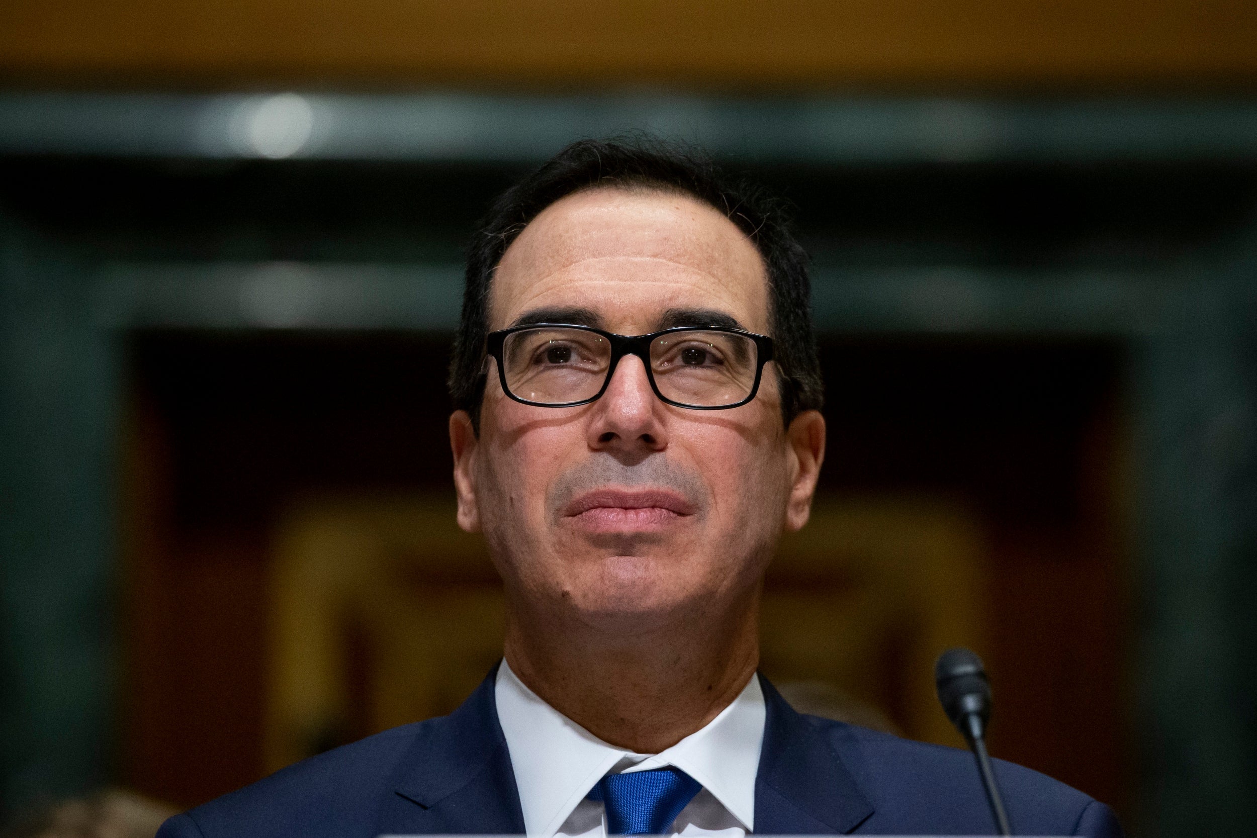 Treasury Secretary Steve Mnuchin pauses as he testifies during a hearing of the Senate Finance Committee