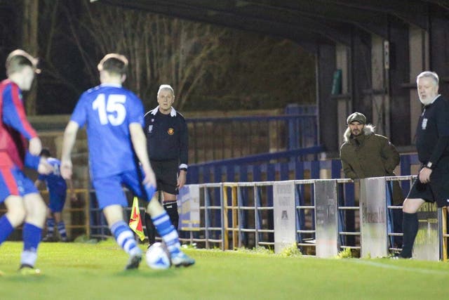 David Beckham pictured standing alone at Clevedon Town