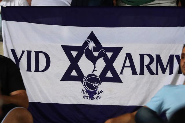 Tottenham fans display a 'Yid Army' flag