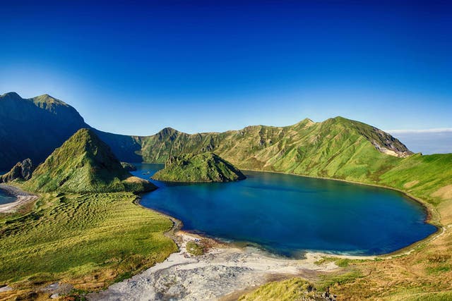 Stock image of Yankicha Island, part of the larger volcanic Ushishir Island in the Kuril Islands archipelago, located between Japan and Russia.