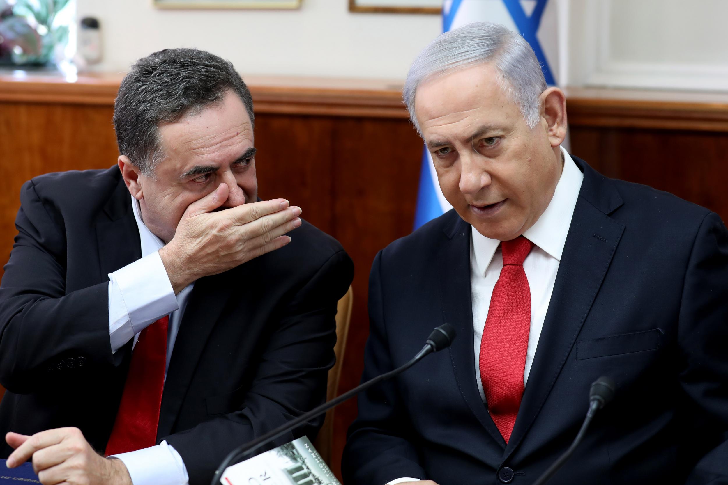 Israeli PM Benjamin Netanyahu listens to foreign minister Israel Katz, left, during a cabinet meeting (AFP/Getty)