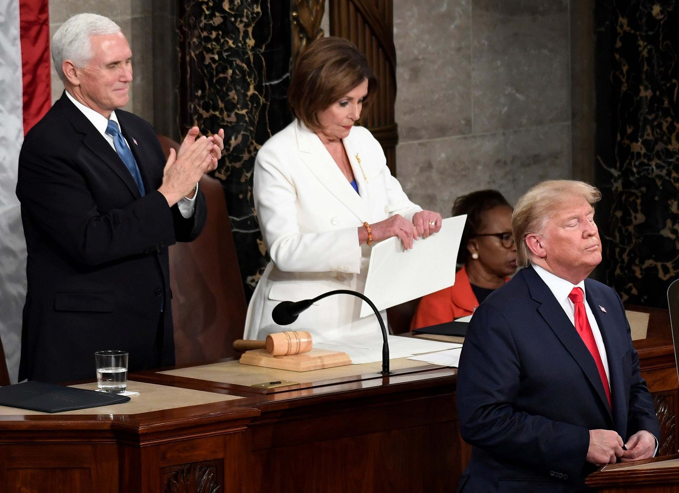 That’s torn it ... Pence applauds as Pelosi tears up Trump’s State of the Union address