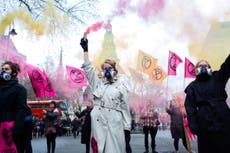 Extinction Rebellion blocks roads in protest of London Fashion Week