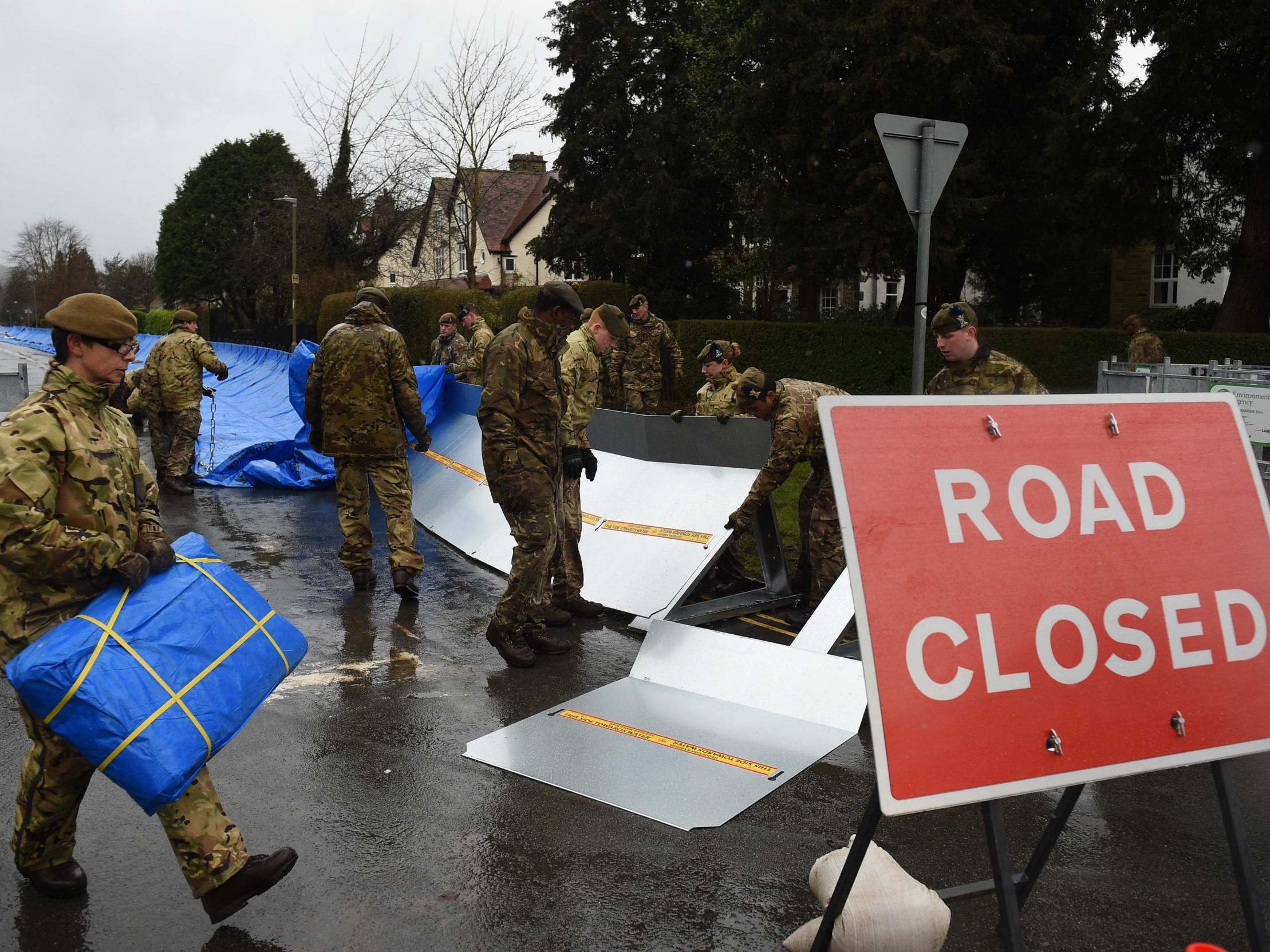 Members of the 4th Battalion Royal Regiment of Scotland erect flood barricades in Ilkley, West Yorkshire earlier this year
