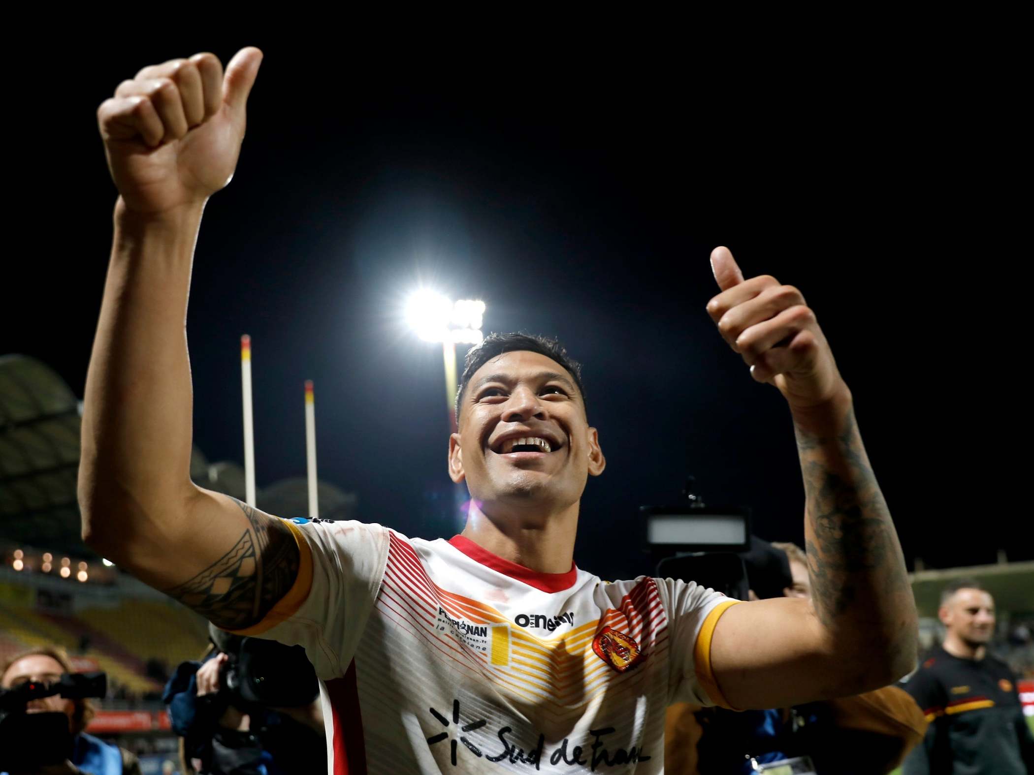 Folau celebrates with his new fans after Dragons ease to victory