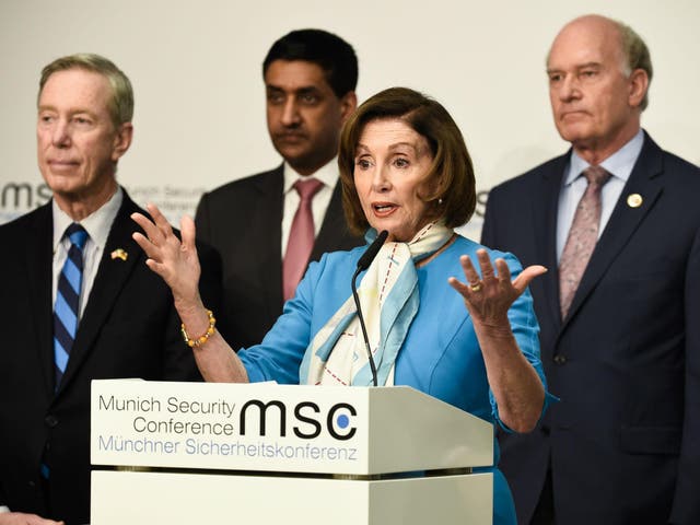 Nancy Pelosi, centre, was one of those to lament the lack of a UK minister in Munich