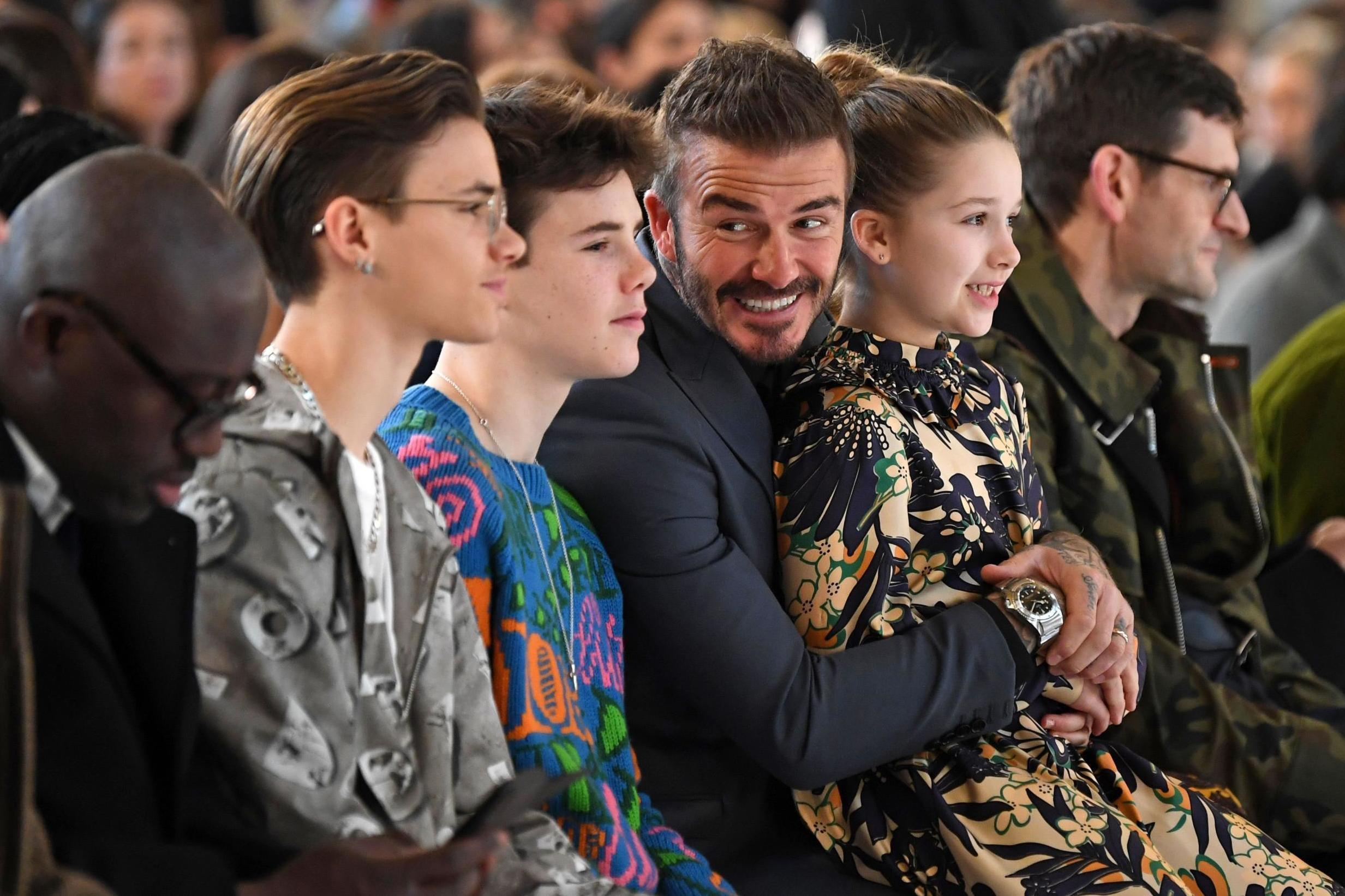 Beckham family watches Victoria&apos;s London Fashion Week show from front row