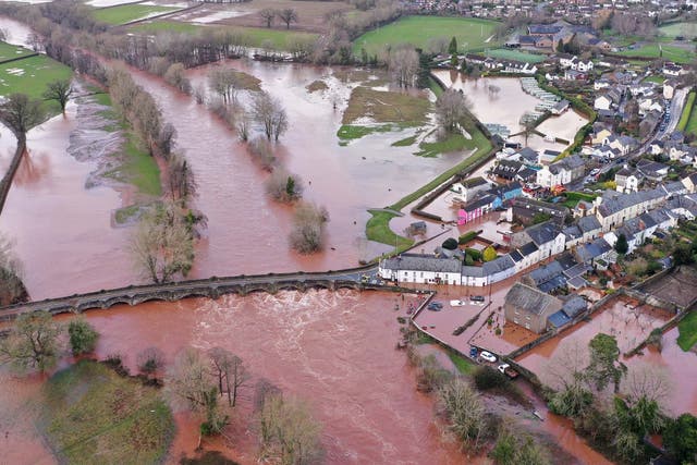 An aerial view of the Welsh village of Crickhowell which has been cut off as the river Usk bursts its banks at Crickhowell bridge near the Bridge End Inn