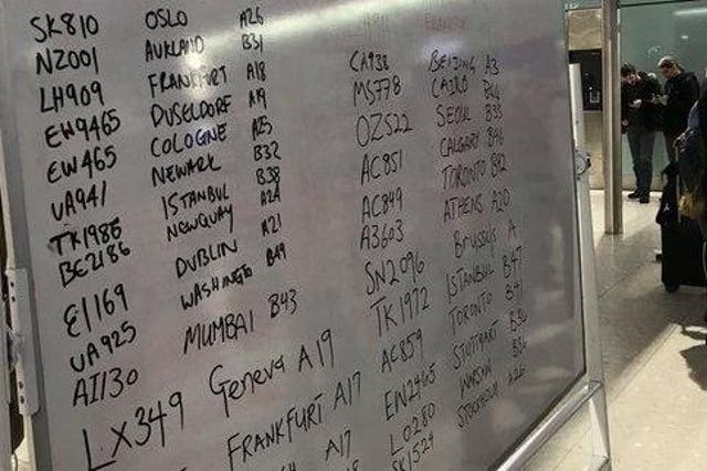 Gate check: departure information at Heathrow Terminal 2 was scrawled on whiteboards