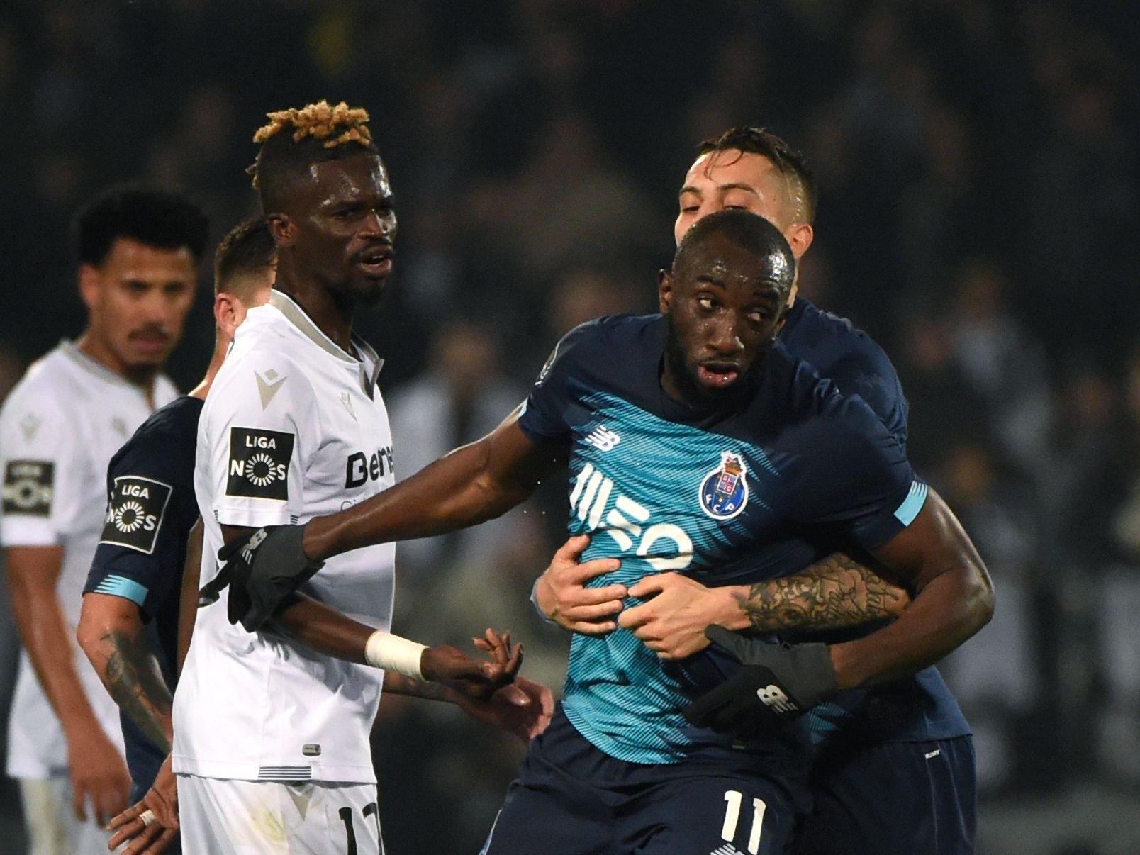Players tried to stop Marega from leaving the pitch (AFP via Getty)