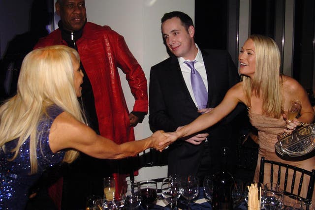 Glitz and glamour: (from left) Donatella Versace, Andre Leon Talley, Dan Peres and Sarah Wynter in 2006