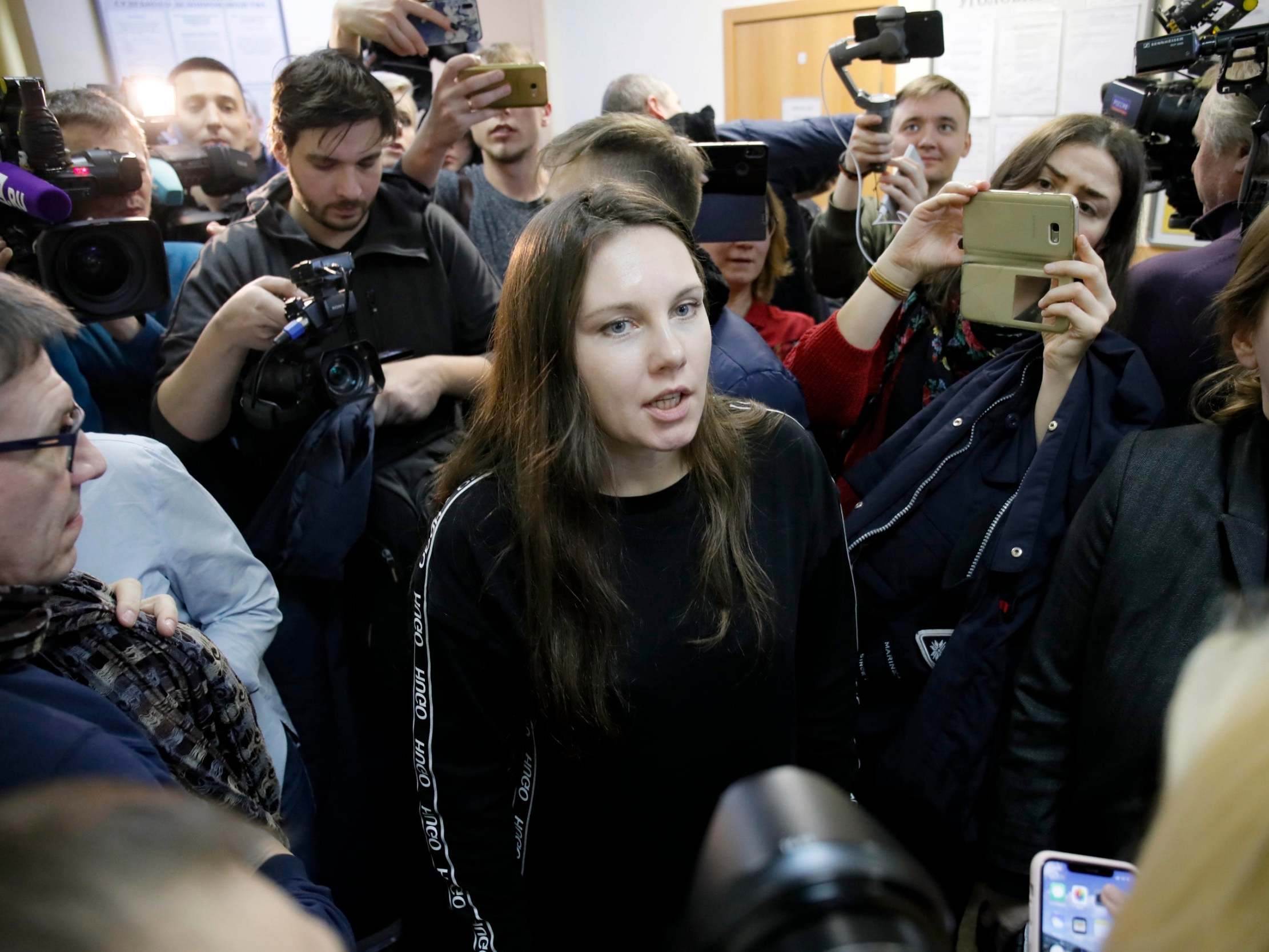 Alla Ilyina speaks to the media in a courtroom in St.Petersburg, Russia