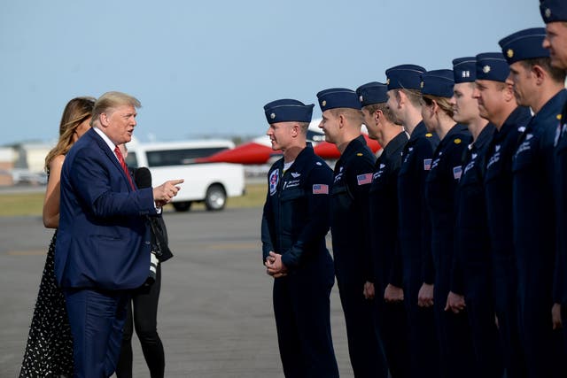 Donald Trump and the first lady meet members of the Thunderbirds, the air demonstration squadron of the US Air Force, after the Nascar Daytona 500 in Florida