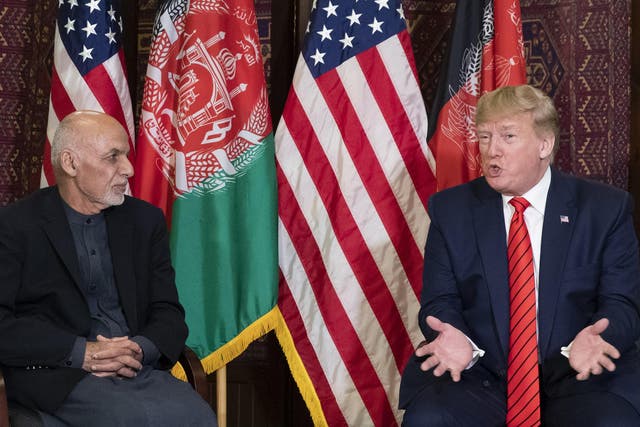 Trump met with Afghan president Ghani during a surprise visit to US troops in November