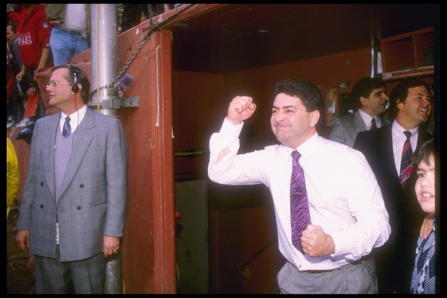 San Francisco 49ers owner Eddie DeBartolo celebrates during a playoff game against the Minnesota Vikings at Candlestick Park in 1990.