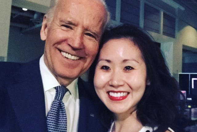 Former Young Democrat treasurer Lindy Li (pictured with Joe Biden) claims she was ousted for her anti-Bernie Sanders tweets