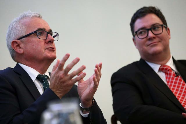 Australian MPs Andrew Wilkie and George Christensen attend a news conference ahead of WikiLeaks founder Julian Assange's U.S. extradition case, in London