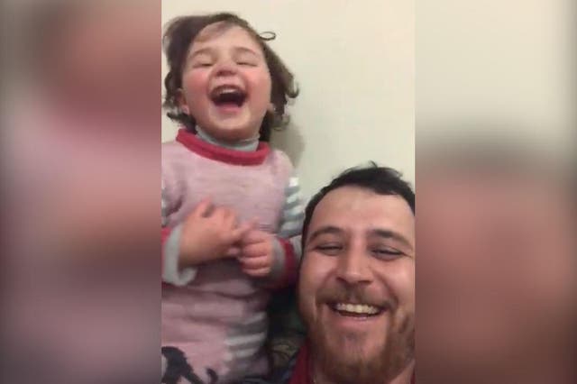 A Syrian father has taught his daughter to laugh at plane and bomb sounds as a game