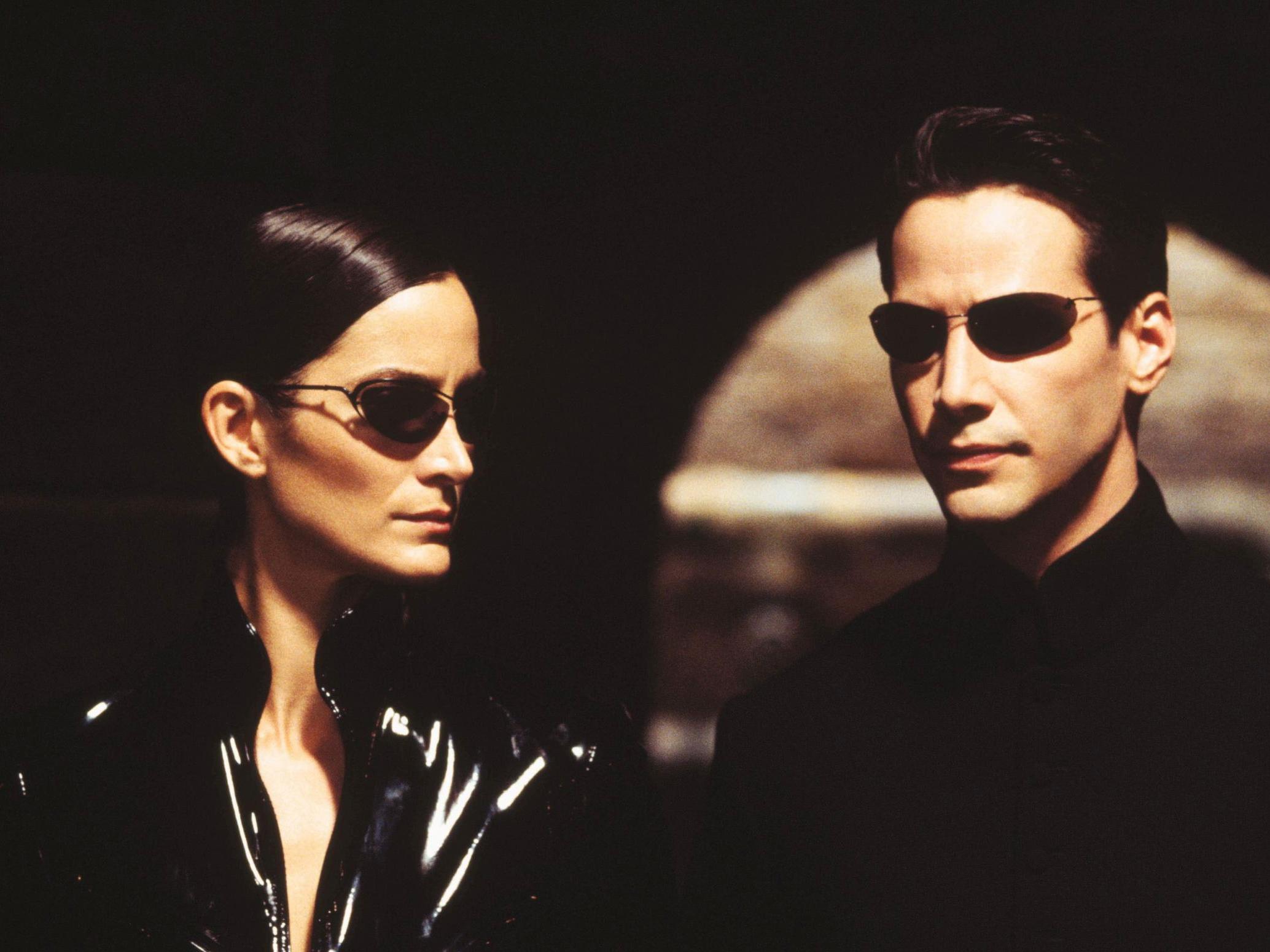 Carrie-Anne Moss and Keanu Reeves in ‘The Matrix’