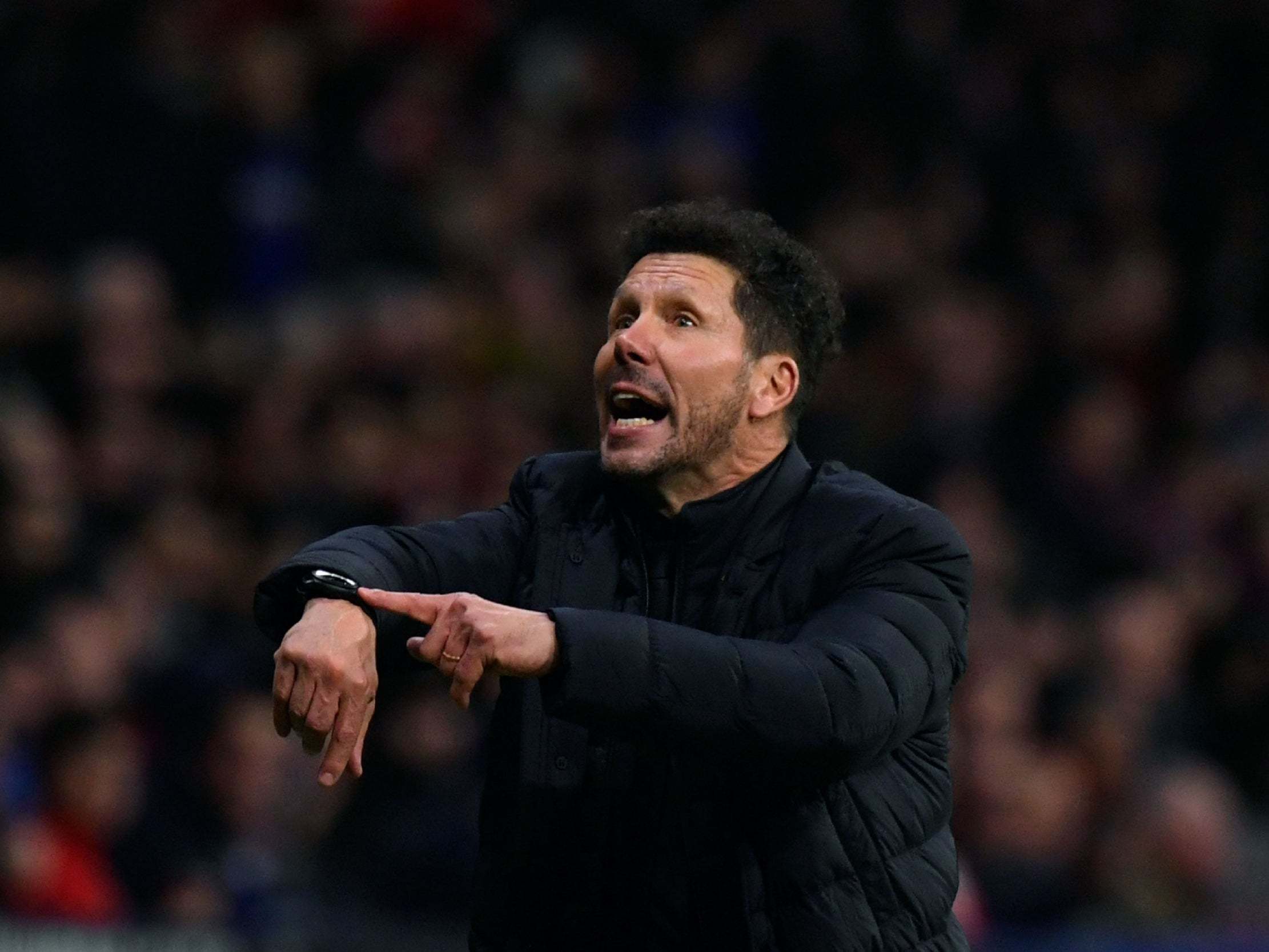 Simeone protests on the touchline against Liverpool