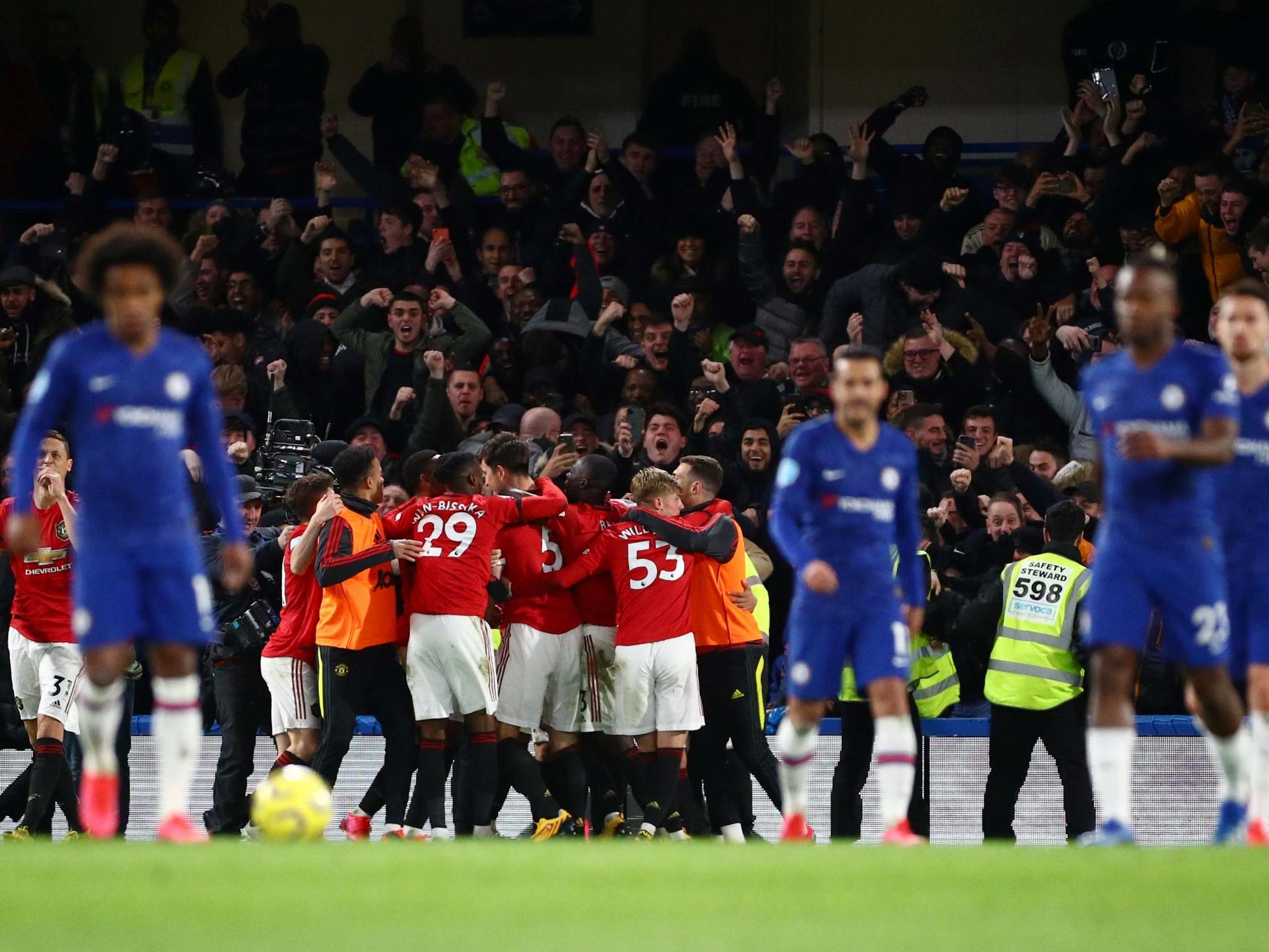 Chelsea eject Manchester United fans for alleged homophobic abuse at Stamford Bridge