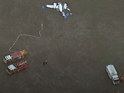 Emergency services respond to a collision of two small planes in Mangalore, Australia, on Wednesday February 19, 2020.