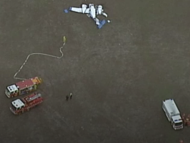 Emergency services respond to a collision of two small planes in Mangalore, Australia, on Wednesday February 19, 2020.