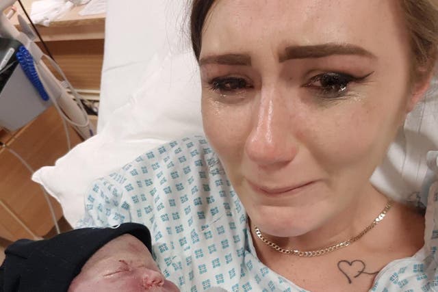 Stephanie Broadley cradles her stillborn baby Beau in a heartbreaking image. Ms Broadley is calling for action on maternity safety in the NHS