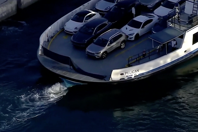 It is believed that the blue Mercedes Benz was parked next to the grey SUV on the Fisher Island Ferry, before going through the blue barrier and into the water
