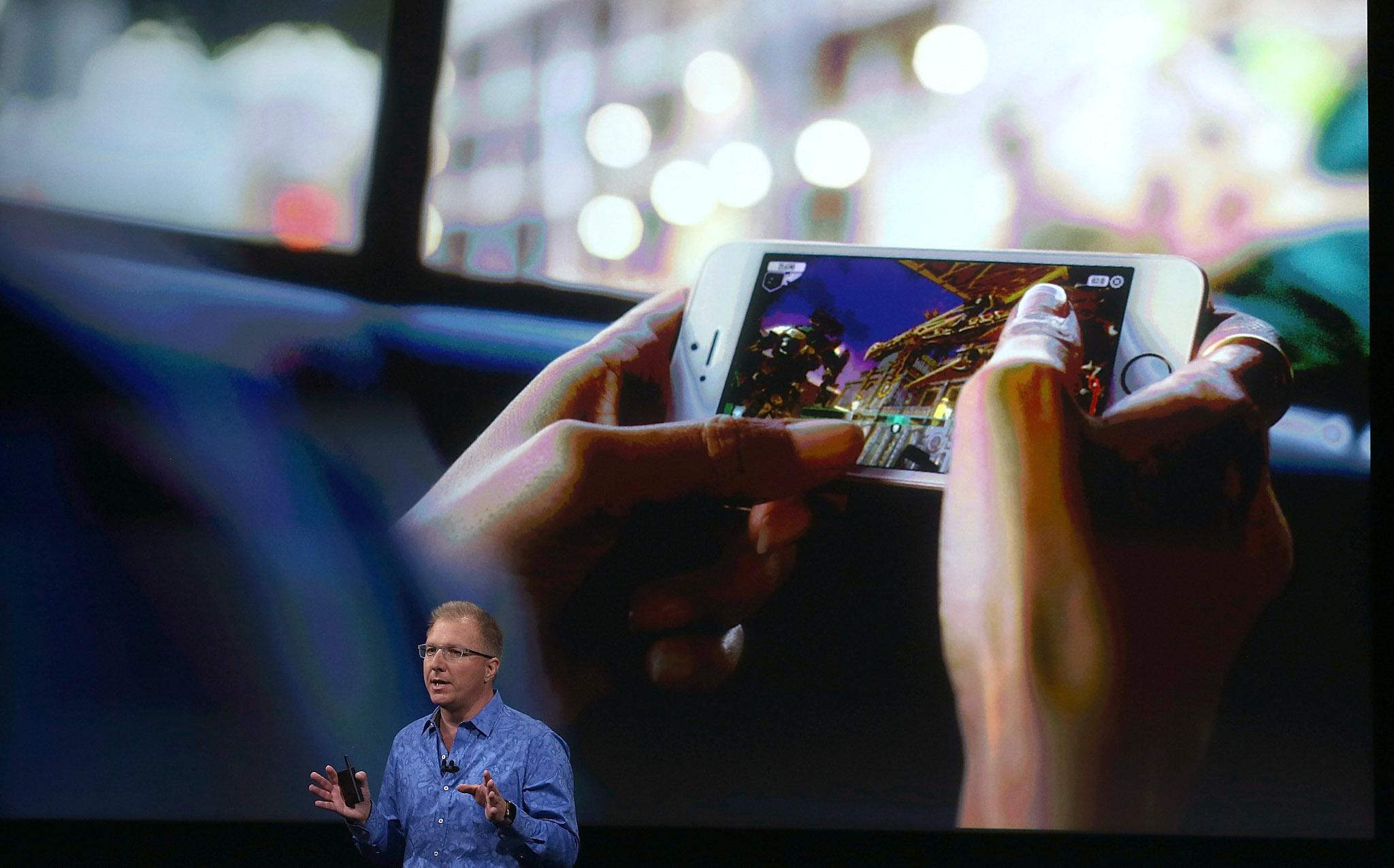 Apple VP Greg Joswiak announces the new iPhone SE during an Apple special event at the Apple headquarters on March 21, 2016 in Cupertino, California