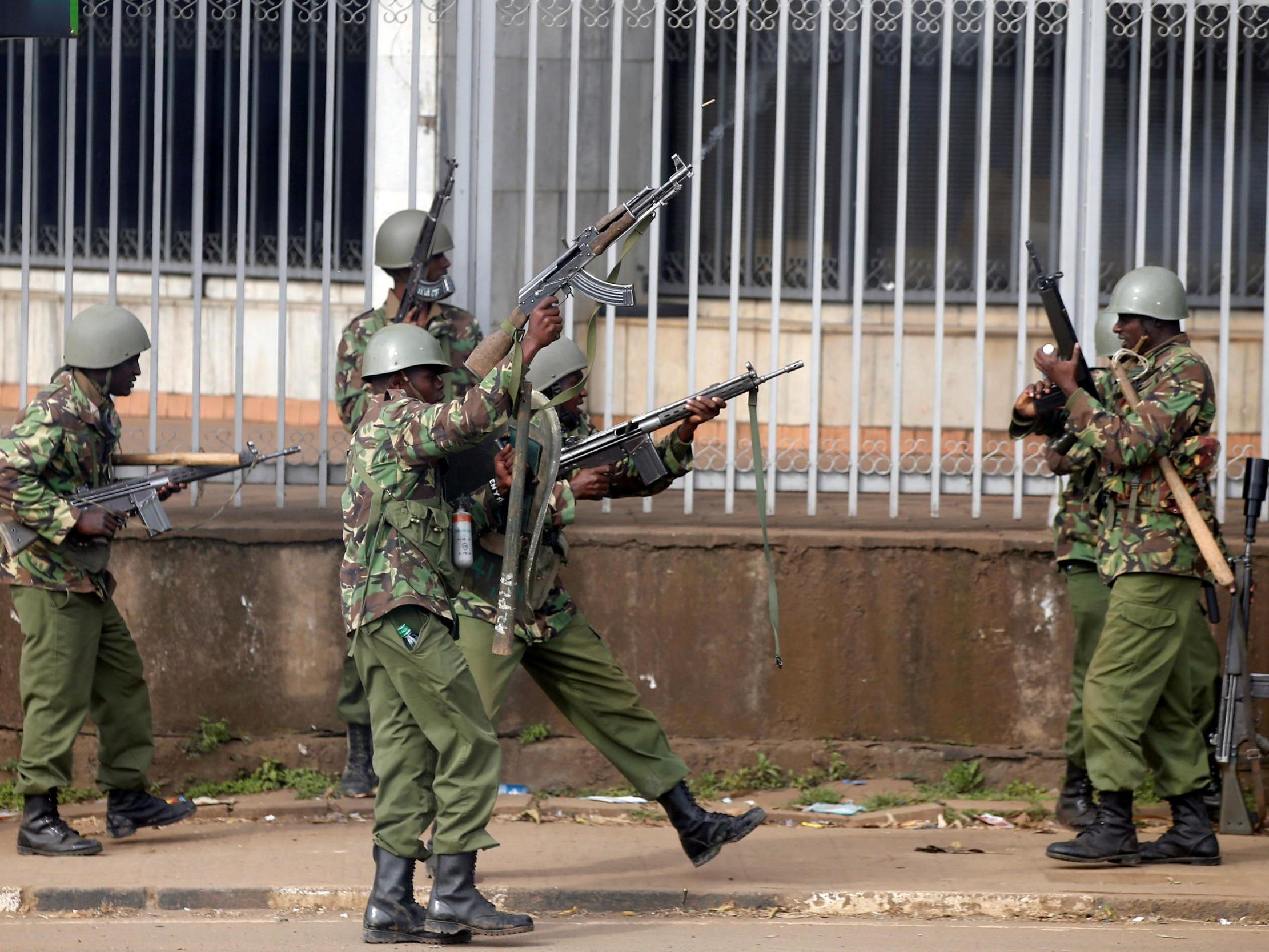 Anti-riot police fire live bullets into the air to disperse supporters of Kenya's opposition coalition in 2017.