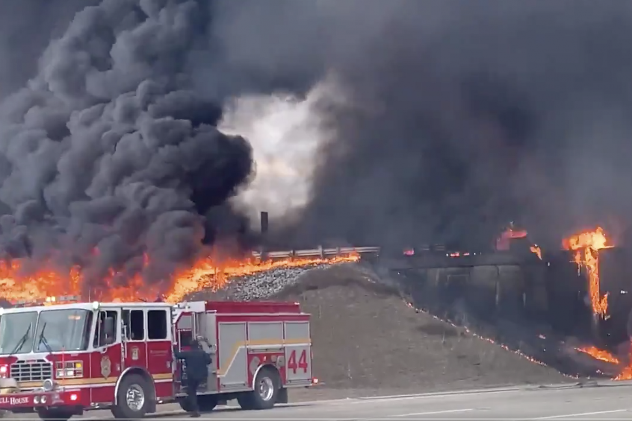 Indiana overpass fire: Dramatic blaze after fuel truck overturns in middle of packed highway