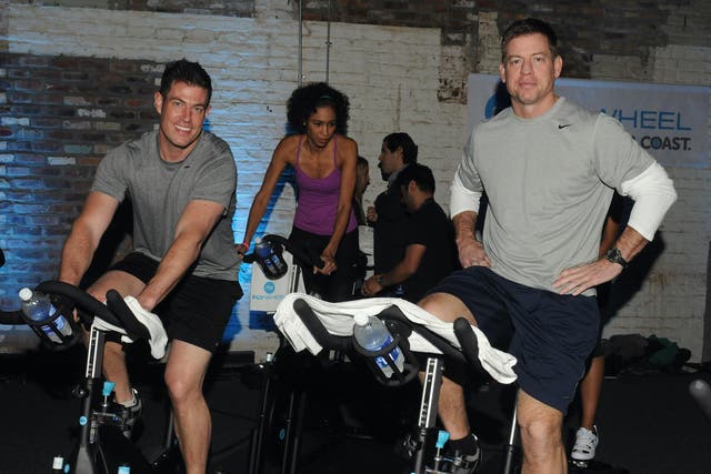 Commentator Jesse Palmer and former NFL player Troy Aikman attend The Flywheel Challenge at the NFL House