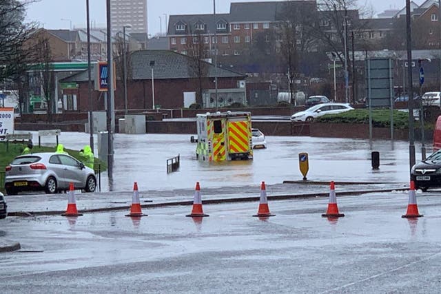An ambulance stuck in flooding in Paisley, Scotland.