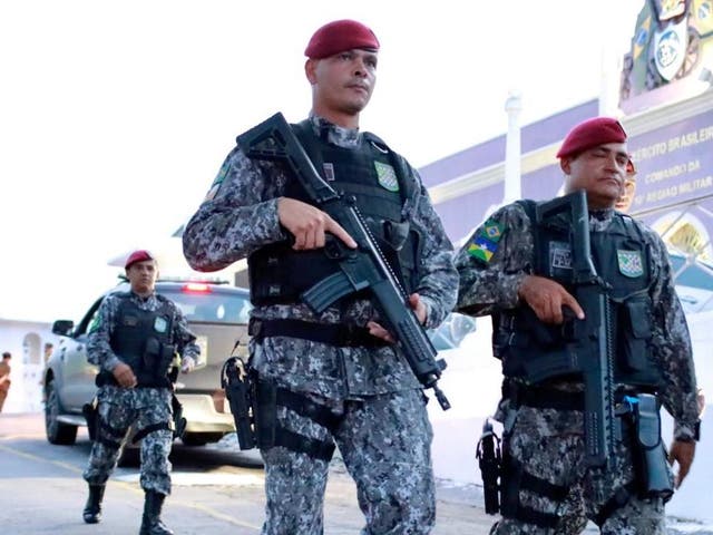 Members of National Force patrol a street during a military police strike in Fortaleza 21 February 2020