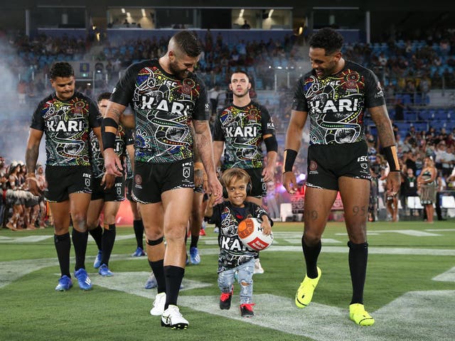 Quaden Bayles runs onto the field before the NRL match between the Indigenous All Stars and the New Zealand Maori Kiwis All Stars at Cbus Super Stadium on the Gold Coast, Australia