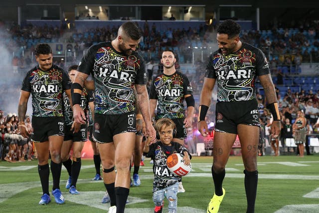 Quaden Bayles runs onto the field before the NRL match between the Indigenous All Stars and the New Zealand Maori Kiwis All Stars at Cbus Super Stadium on the Gold Coast, Australia