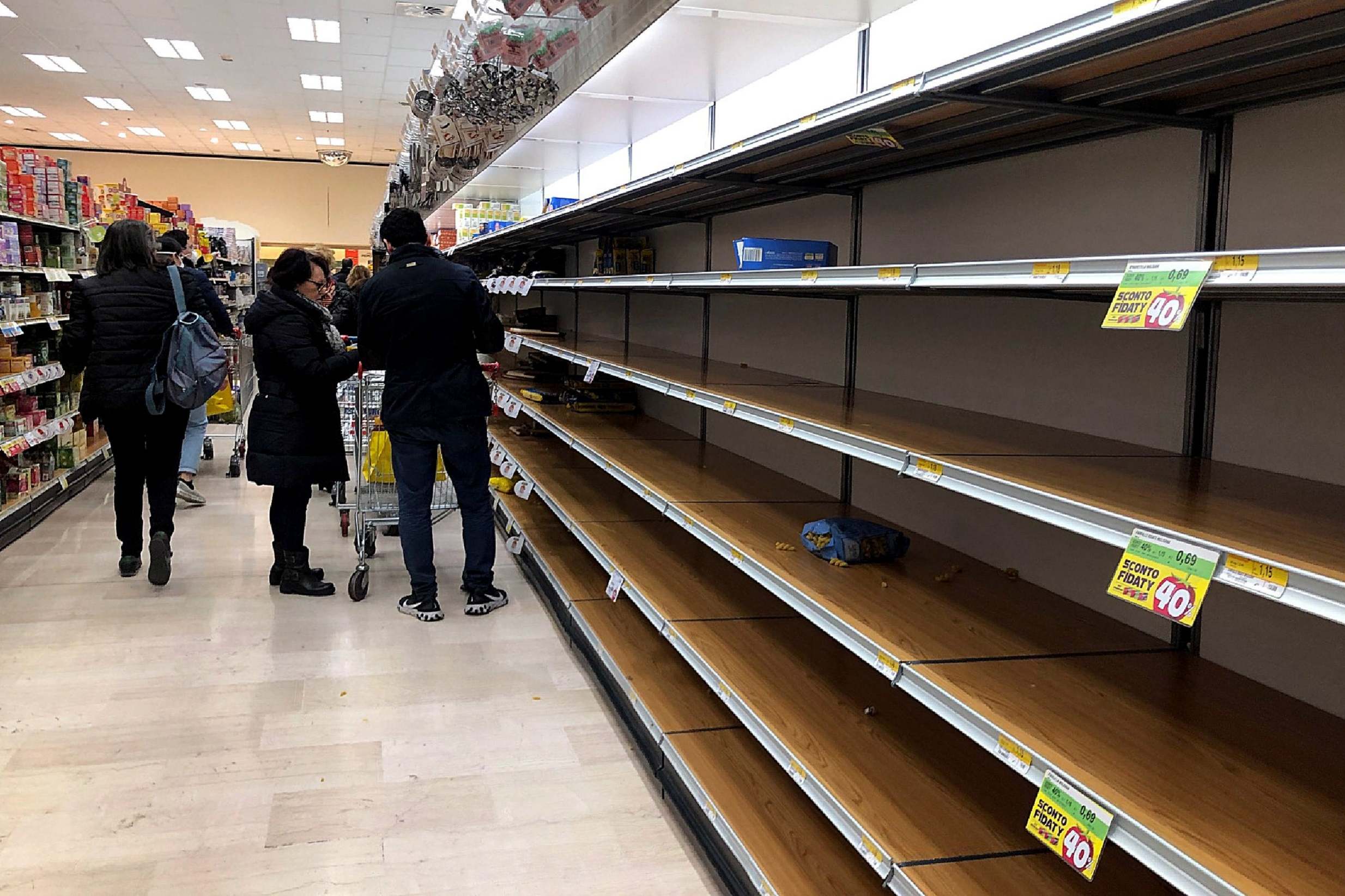 Empty shelves at a Milan supermarket as people stockpile due to the fear of the new coronavirus